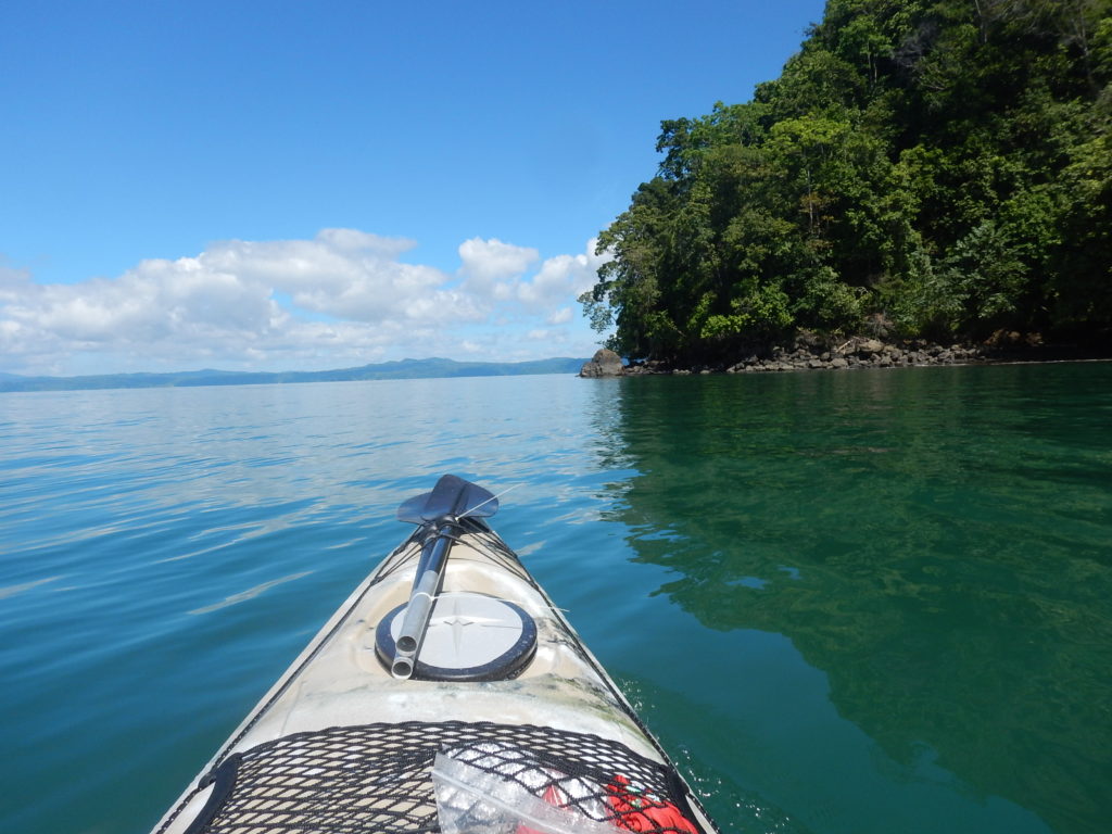 Sea Kayaking across the Golfo Dulce looking for Dolphins during the first day of the North-West Passage Trek by Wild Trails Adventure from Puerto Jimenez